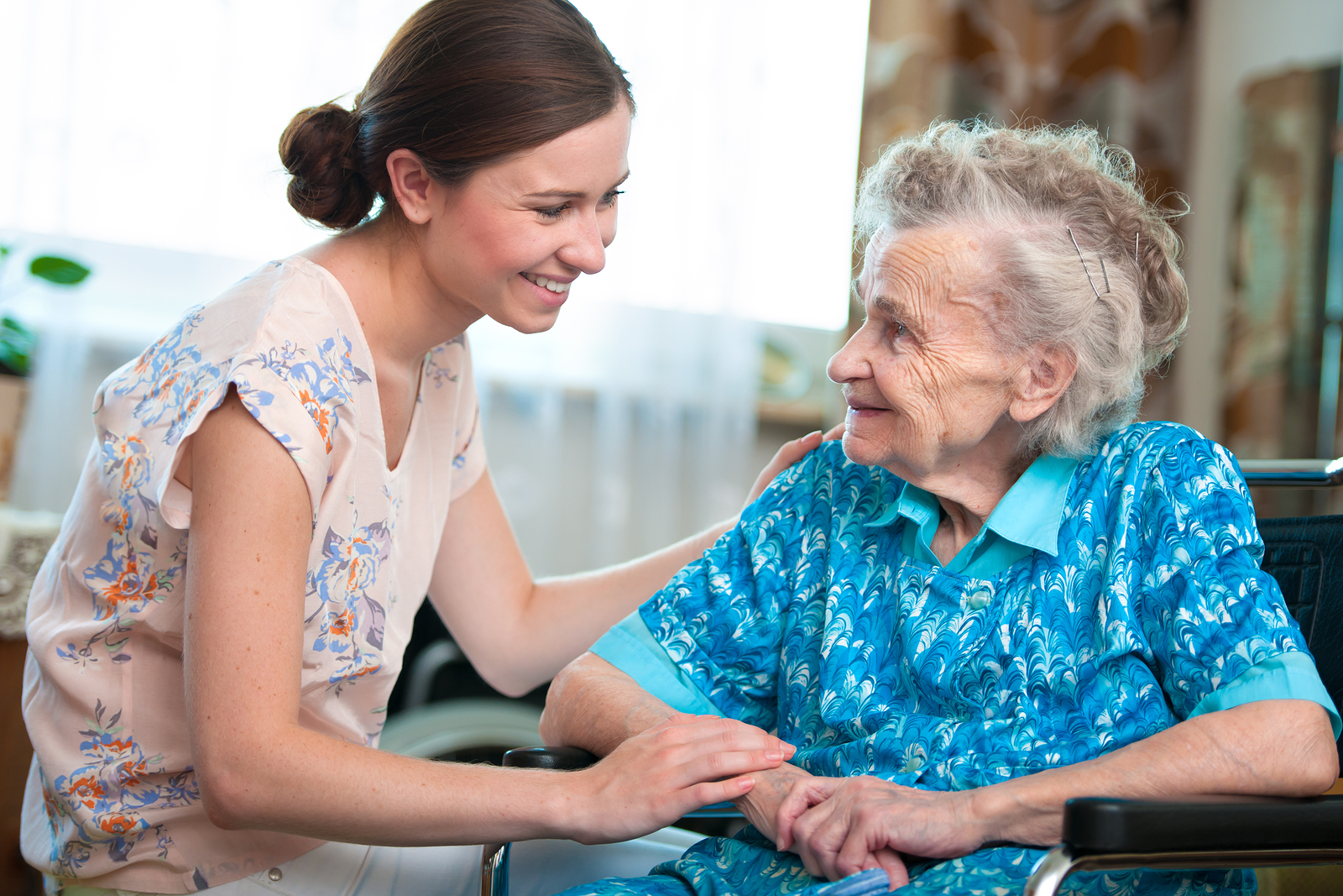 Senior woman with her caregiver at home in Irvine, CA